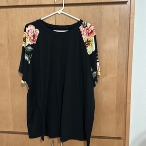 Black top with floral sleeve